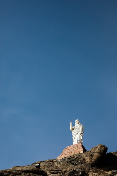 Jesus Christ under the blue sky like the low Angle of photography
